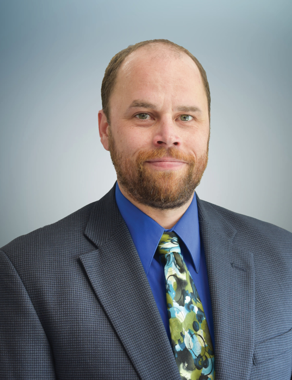 Headshot of John Etzler